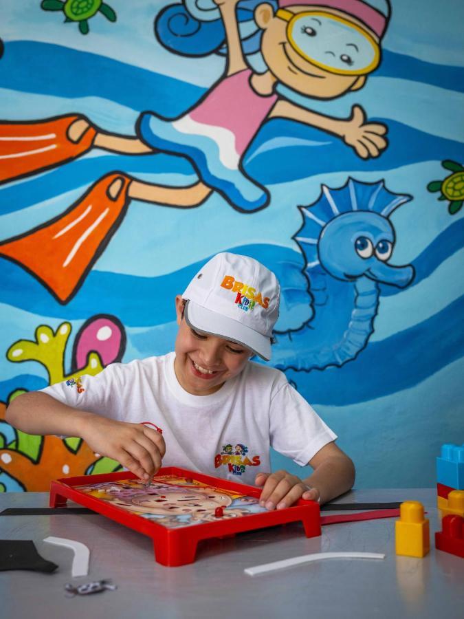 Las Hadas By Brisas Manzanillo Eksteriør bilde Child at the DREAMS Center